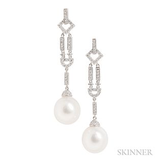 18kt White Gold, South Sea Pearl, and Diamond Earrings, each pearl measuring approx. 12.50 mm, with diamond melee, lg. 2 1/8 in.