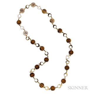 18kt Gold and Tiger's-eye Quartz Chain, with bezel-set tiger's-eye discs each measuring approx. 15.00 mm, 61.5 dwt, lg. 33 in.