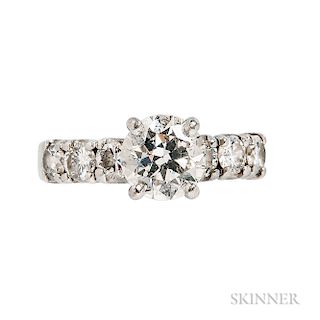 Platinum and Diamond Solitaire, prong-set with a transitional-cut diamond weighing 1.92 cts., the shoulders set with full-cut diamonds,