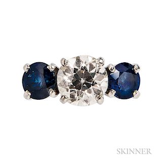 Platinum, Sapphire, and Diamond Three-stone Ring, set with an old European-cut diamond weighing approx. 1.88 cts., flanked by circular-