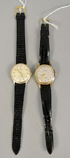 Two piece lot to include LeCoultre mens vintage wristwatch with lizard band, 33.8mm. and Movado Automatic mens vintage wristwatch wi...