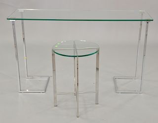 Two chrome and glass tables including one hall table (ht. 30 in., 16" x 52") and one small round table (ht. 23 in.) 
Provenance: Est...