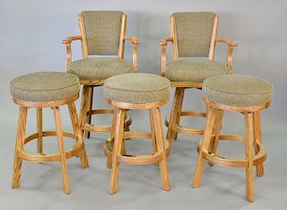 Five swivel bar stools, two with arms. ht. 29 in. & 44 in.