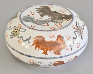 Chinese porcelain covered dish, having painted foo dog decoration and iron red seal mark on bottom. ht. 5 in., dia. 10 in.