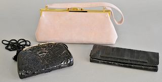 Three purses or handbags to include Judith Leiber, Gucci, and Stuart Weitzman.