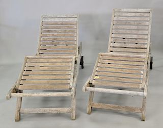 Pair of Rockwood teak lounges with two adjustments. lg. 78 in.
