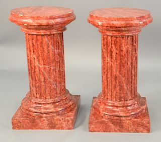 Pair of faux marble pedestals. ht. 30 1/2 in., top dia. 16 in.