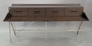Custom contemporary oak cabinet with eight drawers and flip top on stainless base. ht. 37 in., top: 20" x 72" 
Provenance: Estate fr...