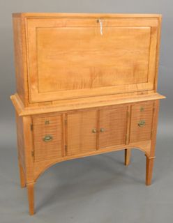 Maple and tiger maple drop front desk over four doors. ht. 46 in., wd. 36 1/2 in.