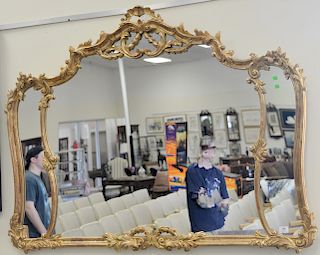 Gilt three part Louis XV style mirror. 44 1/2" x 58"