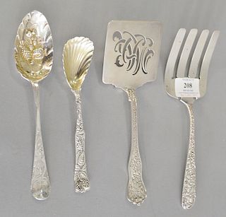 Four piece sterling serving pieces to include Tiffany shell spoon, Tiffany server, Jenkins serving fork, and early English berry sp...