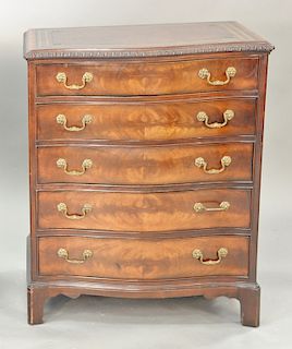 Chippendale style diminutive serpentine chest with leather top. ht. 30 1/2 in., top: 18" x 25"