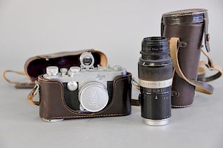 Leica large camera with leather case marked Ernst Leitz Wetzlar DBP with viewfinder, lens marked Elmar F=5cm 1:2.8, camera NR. 907 533.