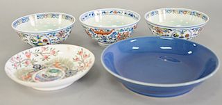 Five chinese porcelain dishes to include blue glazed plate, small dish with enameled peach tree, coy, and butterfly and a set of thr...