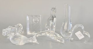 Eight piece Baccarat crystal group to include three paperweights, duck, lion, cat, dolphin, and a vase. tallest ht. 7 in.