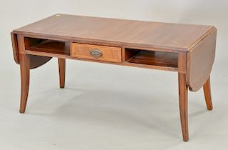 Margolis mahogany drop leaf coffee table with one drawer. ht. 18 3/4 in., top: 18" x 38"