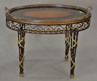 Iron and brass tray top table with glass top, attributed to Maitland Smith. ht. 23 in., top: 24" x 32"