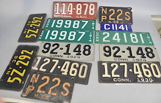 Group of 14 license plates including small enameled plate, pair of enameled plates, two Connecticut plates, N.Y. plates, etc.