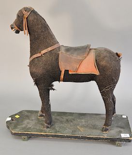 Horse pull toy, felt covered (3 wheels not on, but available). total height 24 1/2 in., total lg. 25 in.