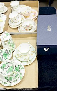 Two tray lots with cups, saucers, and matching plates, six sets and a teapot, cups, and saucers in a fitted box.