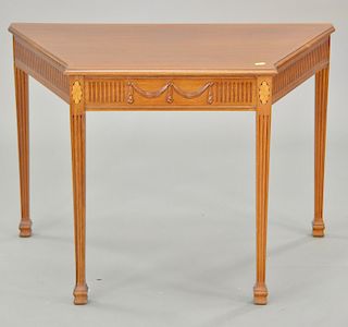 Margolis mahogany shaped top table. ht. 26 in., wd. 38 in., dp. 22 in.