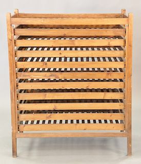 Drying rack with eleven pull-out shelves. ht. 52 in., top: 20 1/2" x 43"