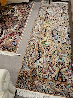 Two Oriental throw rugs, 4'2" x 7' and 3' x 5'2".