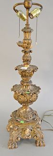 Italian Rococo carved gilt wood candlestick table lamp (top carving chipped).  Provenance: Estate from Park...