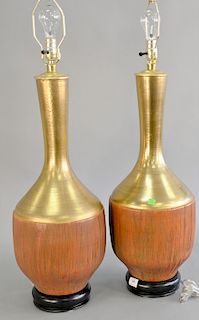 Two pairs of mid-century modern gilt ceramic table lamps. ht. 35 in. & 38 in.  Provenance: Estate from Park Avenue, New York