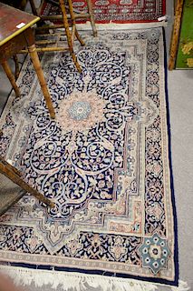 Two Oriental throw rugs, 4' x 6' and 4' x 6'5"