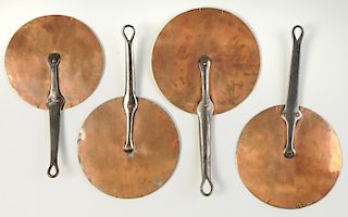 Four French Copper and Iron Pot Covers