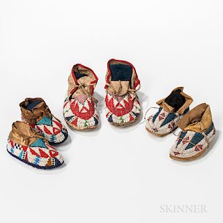 Three Pairs of Children's Beaded Hide Moccasins