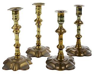 Two Fine Pairs George II Brass Candlesticks