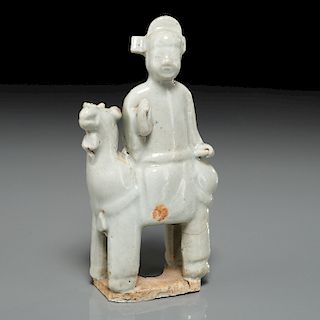 Old Chinese figure of boy atop llama