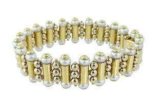 (1) One 18 Karat Yellow Gold Pearl Bracelet.