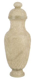 A CHINESE PIERCED WHITE-GREEN JADE VASE AND COVER, 20TH CENTURY