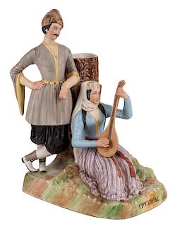 A RUSSIAN PORCELAIN SPILL VASE WITH A GEORGIAN MAN AND WOMAN, FROM THE "PEOPLE OF RUSSIA" SERIES, GARDNER PORCELAIN FACTORY, MOSCOW, 1880S-1890S