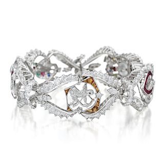 A Multi-Colored Gemstone and Diamond Charm Bracelet