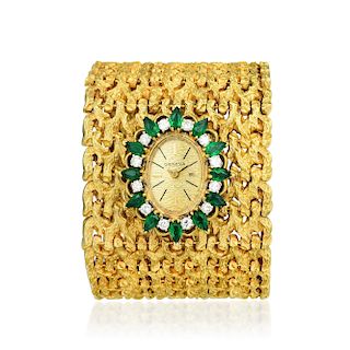A Wide Emerald and Diamond Watch Bracelet