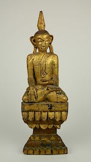 Carved and painted wood buddha