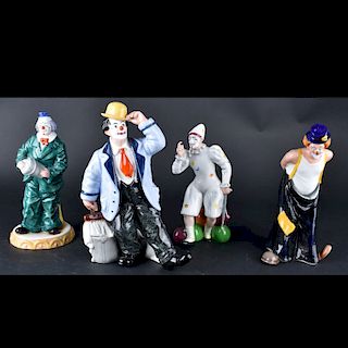Four Royal Doulton Figurines