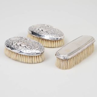 Two Gorham Silver-Mounted Clothes Brushes and a Tiffany Silver-Mounted Clothes Brush