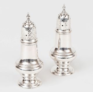 Pair of Small Silver Casters and Covers