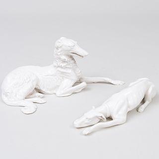 Two Nymphenburg Porcelain White Glazed Models of Recumbent Hounds