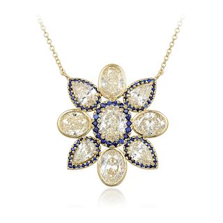 A Sapphire and Diamond Flower Pendant Necklace