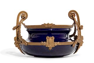 A French bronze and blue earthenware center bowl