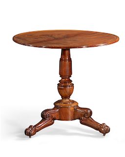 A Louis Philippe mahogany tilt top tripod table