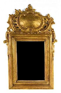 A Louis XV Style Giltwood Mirror Height 37 3/4 x width 23 1/2 inches.