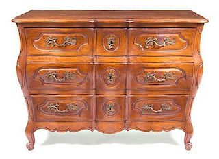 A Louis XV Provincial Style Commode Height 35 x width 50 x depth 21 1/4 inches.