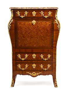 * A Regence Style Gilt Bronze Mounted Parquetry Secretaire a Abattant LATE 19TH CENTURY Height 62 x width 39 x depth 17 inches.